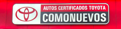 Toyota certified used cars logo and sign for Comonuevos dealership on red background